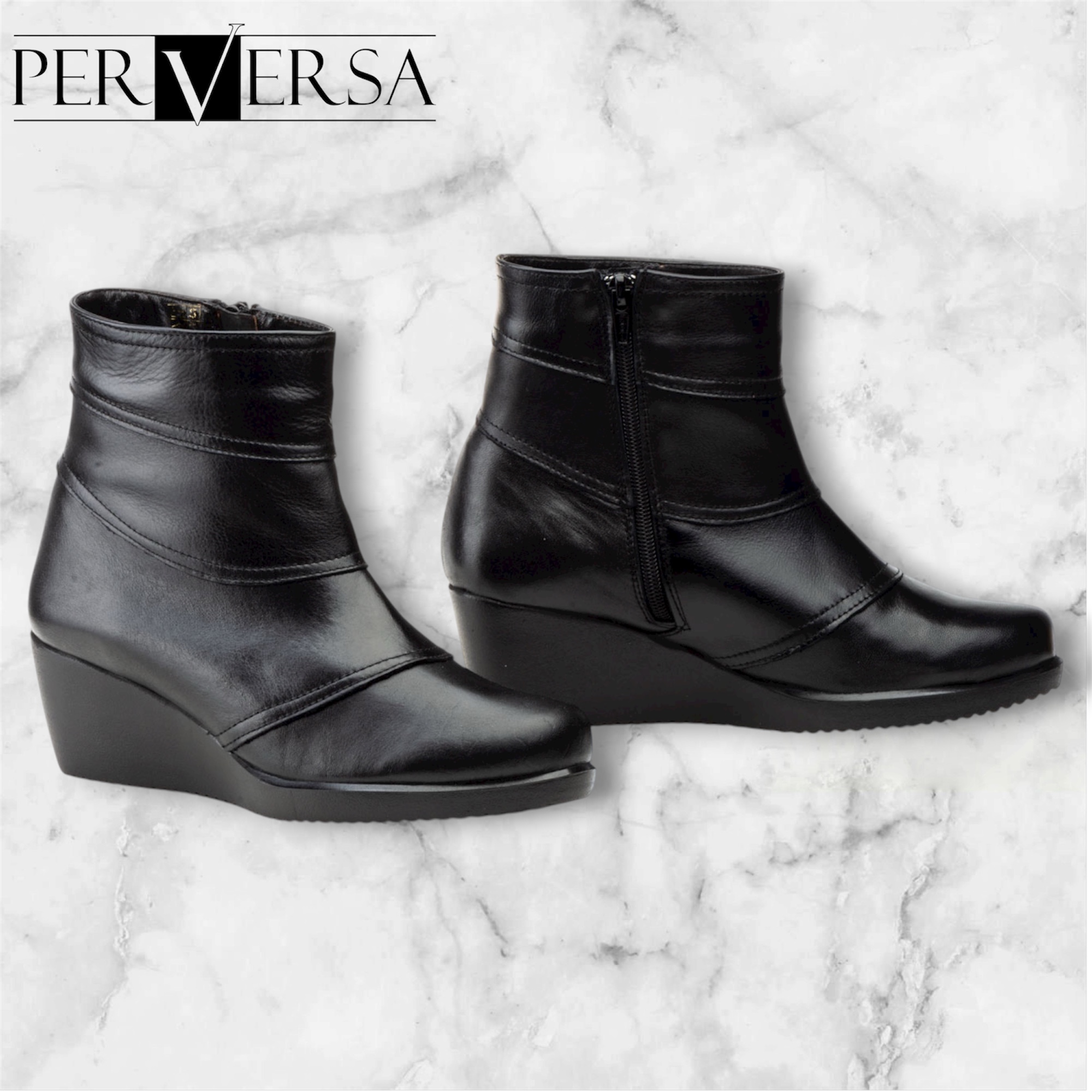 5682 Botín con cuña en piel de color negro, cremallera lateral y fabricada en España tallas 36 al 41.